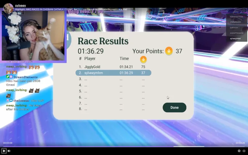 Still of Twitch influencer Sylveey holding her cat and sharing Race Results as part of the Later and Chobani campaign
